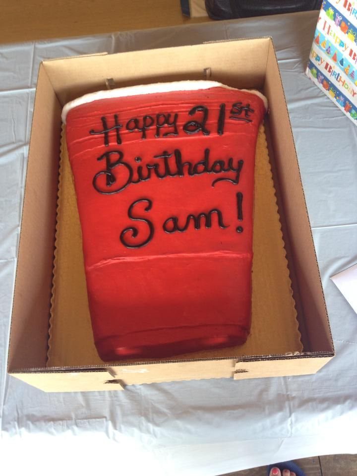 Red solo cup shaped cookie cake with Happy 21st Birthday Sam icing.