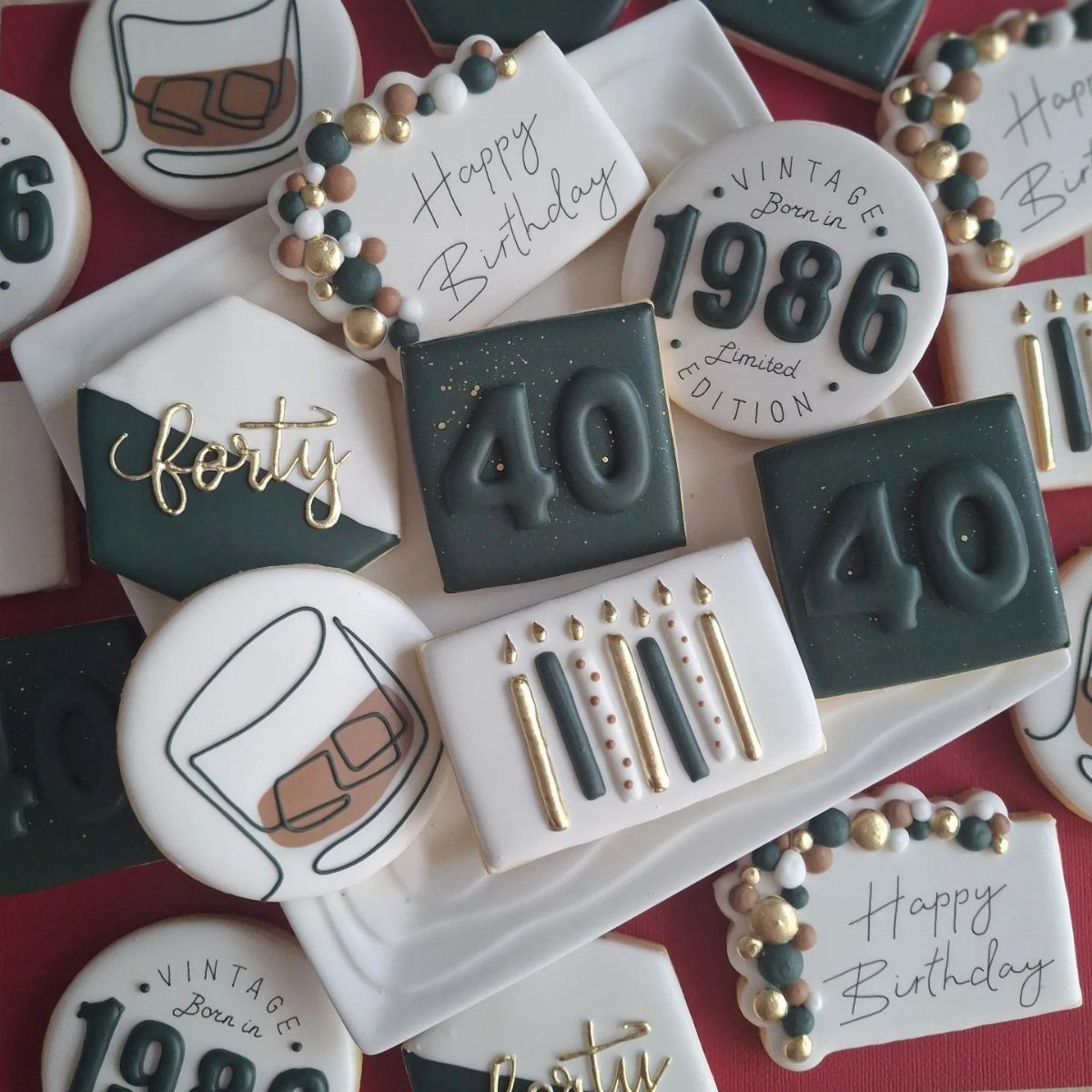 Decorated birthday cookies with the number 40 and vintage 1986 text in green.
