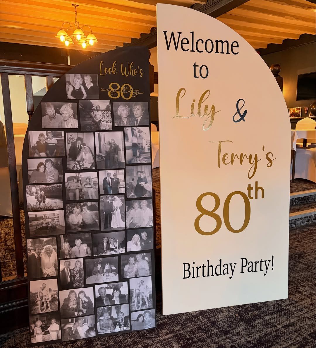 Photo memory board with black-and-white pictures next to an 80th birthday welcome sign.