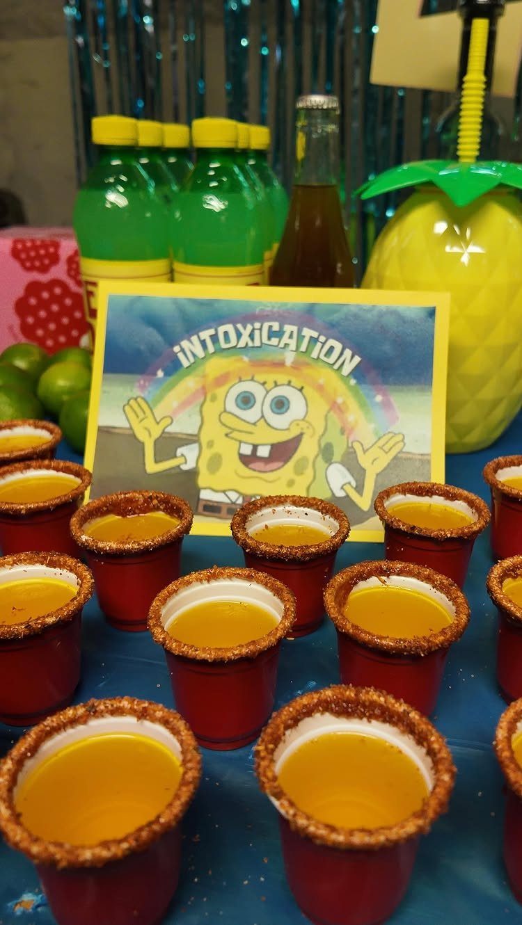 Red shot glasses with yellow drinks and a funny SpongeBob intoxication sign.